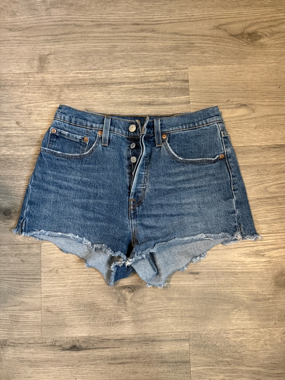 Levi's Medium Blue Button-Fly Frayed Hem Jean Shorts